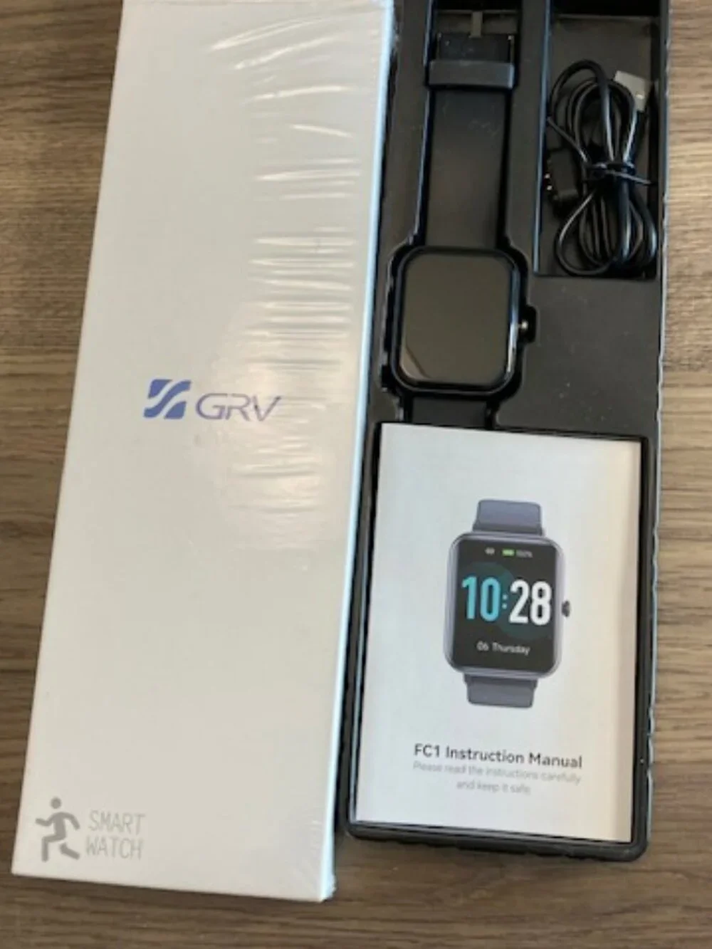 Black Smartwatch with Silicone Band and Color Display